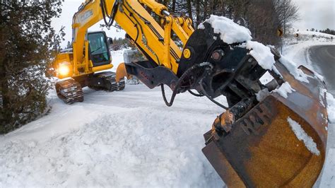 snow plowing with mini excavator|mini x boom snow removal.